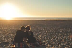 man and woman on beach