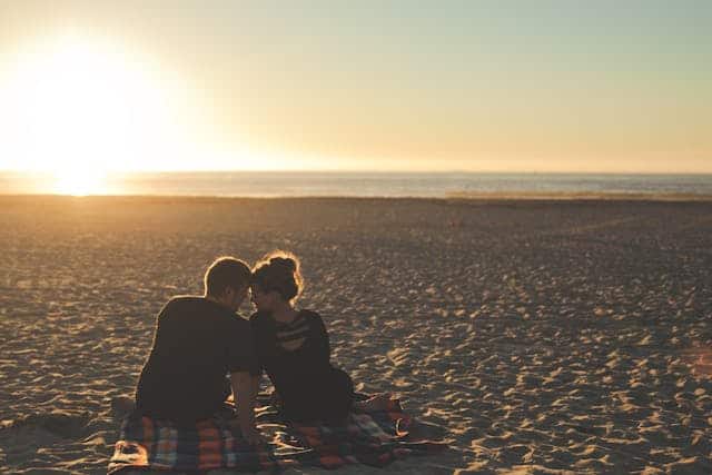 man and woman on beach